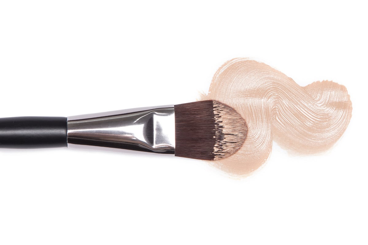 Liquid foundation with makeup brush
